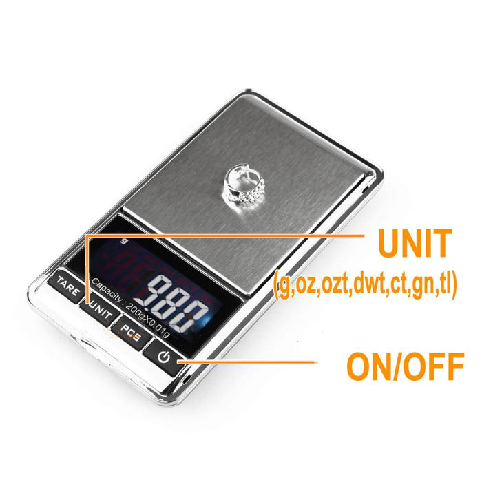 Digital pocket scale with a diamond on a white background