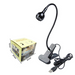 Black adjustable  lamp with USB cable and packaging on a white background