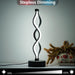 Modern LED table lamp with stepless dimming feature on a neutral background