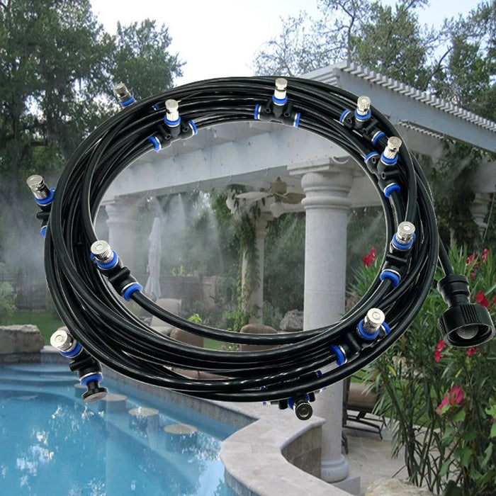 Coiled garden hose with multiple nozzles near a pool and gazebo
