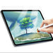 Tablet with stylus drawing a scenic landscape on screen