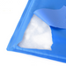 Blue silicone mold with a white silicone product inside on a white background