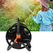 Garden hose reel with a person watering plants in the background