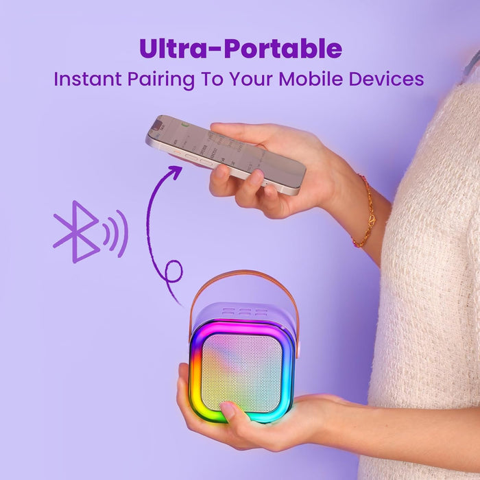 Person holding a colorful Bluetooth speaker with text about instant pairing to mobile devices on a purple background