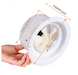 Hand holding a white fan grille with measurements indicated