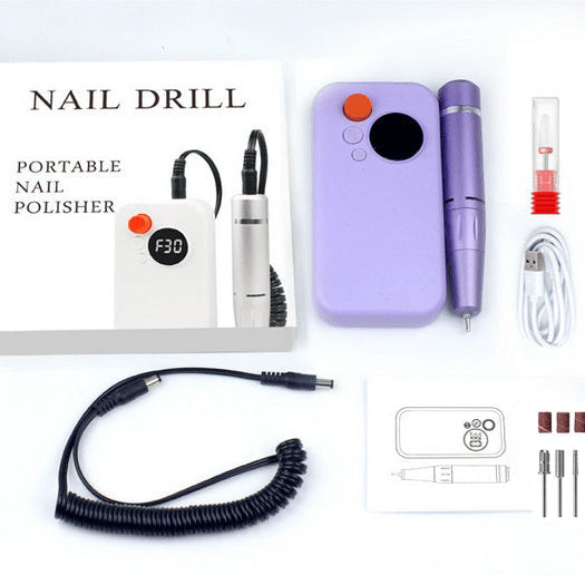 Portable nail drill set with accessories on a white background