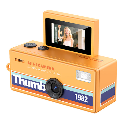 Orange mini camera with a screen displaying a woman, on a white background