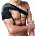 Man wearing a shoulder brace on a white background