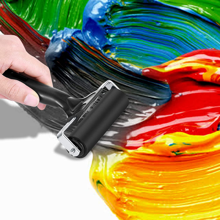 Paint roller with colorful paint strokes on a white background