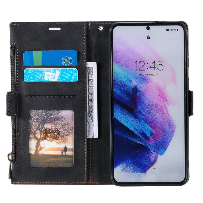 Black phone wallet case with card slots and photo frame, attached to a smartphone.