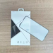 Screen protector with packaging on a wooden surface