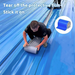Person applying a roll of blue protective  tape on a blue surface with text instructions.