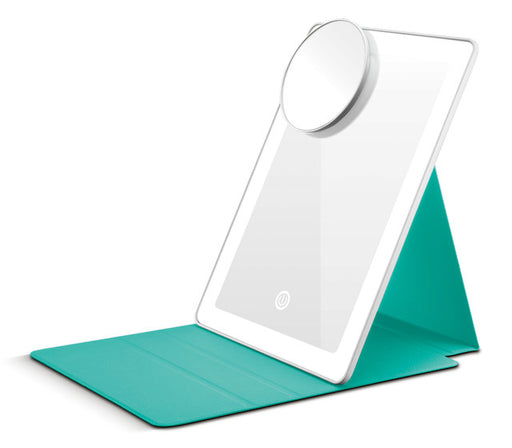 White tablet on a green stand with a white background