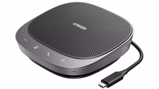 Anker wireless charging pad with USB cable on a white background