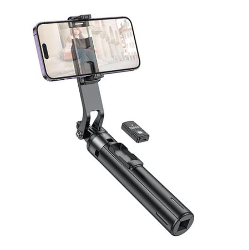 Phone holder with remote control on a white background