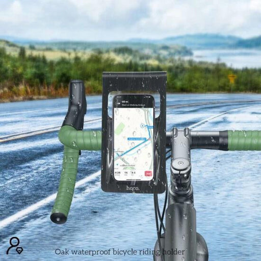 Bicycle handlebar with a waterproof phone holder on a road with a scenic background
