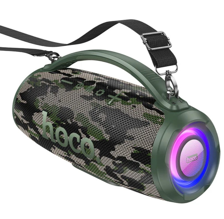 Camouflage-patterned Bluetooth speaker with a purple light on a white background
