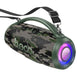 Camouflage-patterned Bluetooth speaker with a purple light on a white background