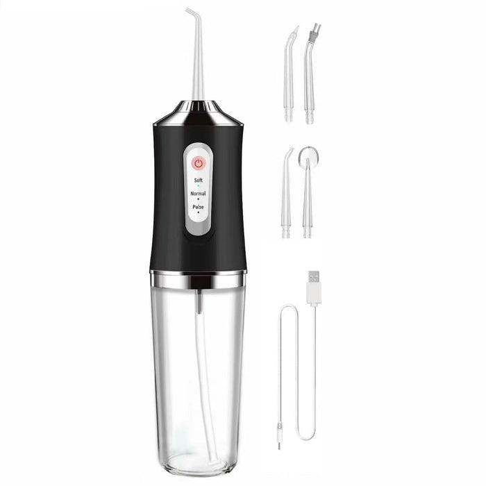 Black dental water flosser with various nozzles on a white background