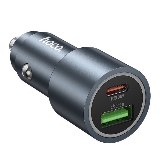 Car charger with USB ports on a white background