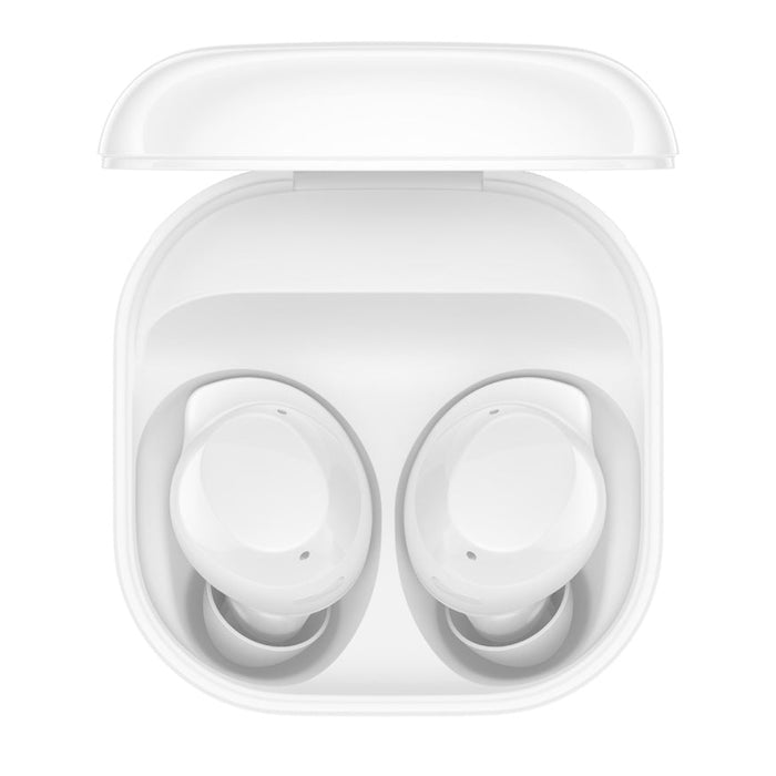 White wireless earbuds in a transparent charging case on a white background