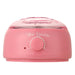 Pink wax warmer with control knob on a white background