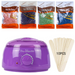 Purple wax warmer with packages of hard wax beans and wooden sticks on a white background