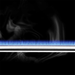 Close-up of a gas stove burner with blue flames on a black background