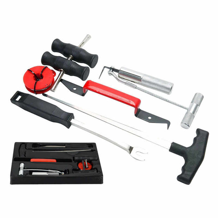 Set of car repair tools including a tire pressure gauge, wrenches, and other automotive tools on a white background.