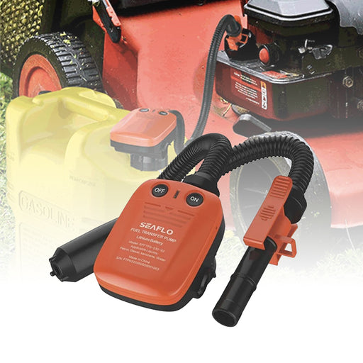 An orange and black automatic fuel transfer pump with a flexible hose attached, displayed in an outdoor setting.