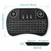 Black wireless keyboard with measurements and features on a white background