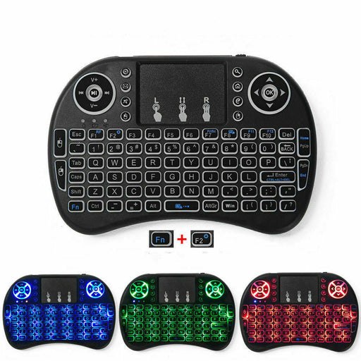 Black wireless keyboard with colorful LED backlighting on a white background