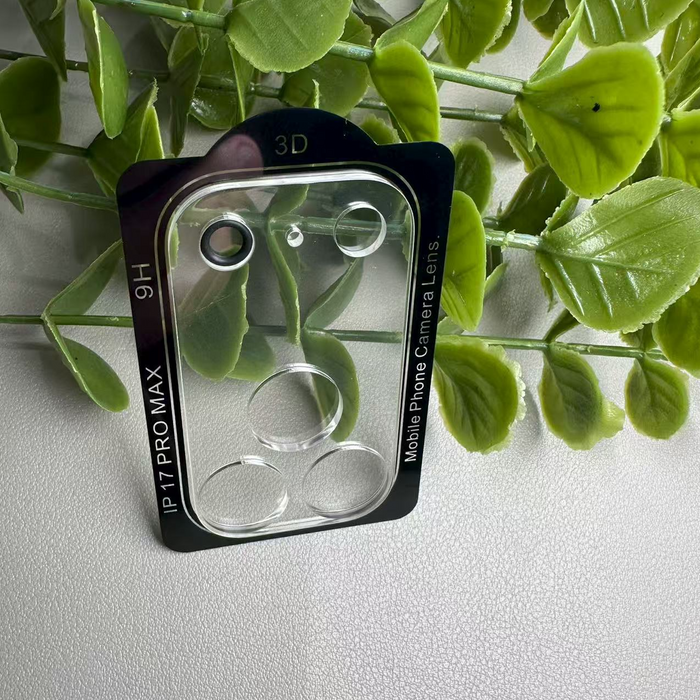 Phone camera lens protector with '3D' and '9H' text on a green leaf background