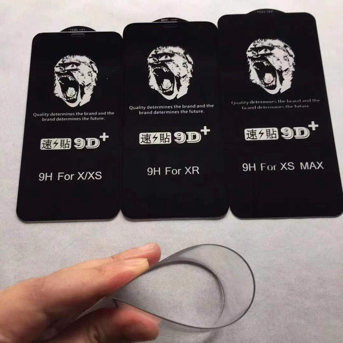 Three black cards with 9H branding and text, held by a hand with a clear object in front of them on a light gray background.