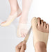 A pair of beige bunion corrector socks being worn on human feet, with an inset showing the corrector in a neutral position.