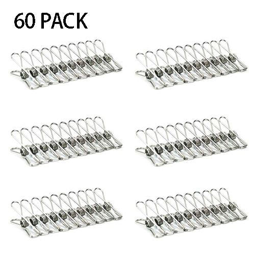 
A clean, product-style image showing a large quantity of stainless steel mini spring clips (or clothes pegs). They are arranged in six rows of ten clips each, totaling 60 clips, displayed against a white background. The text "60 PACK" is in the upper left corner.
