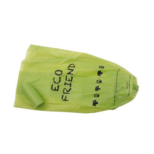A single bright green pet waste bag is laid flat, with a full roll of bags placed on top of it. The flat bag features black 'ECO FRIEND' text and a row of black paw prints printed on its surface.