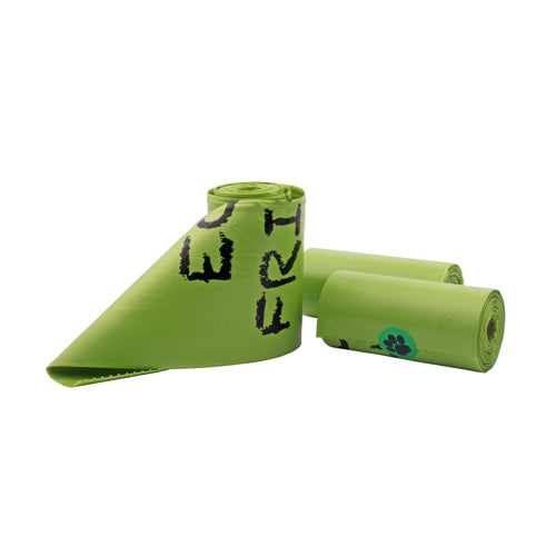 Three rolls of bright green pet waste bags shown against a white background. One roll is partially unwound in the foreground, showing black text (likely 'ECO FRIEND') printed on the bag and a black paw print visible on another roll.